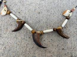 Sold at Auction: (2) Native American style BEAR Claw and ELK ...