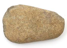 Sold at Auction: CARVED LITHIC HAND TOOL