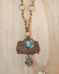 She's Got Rings mixed metal pendant necklace | anna martin art