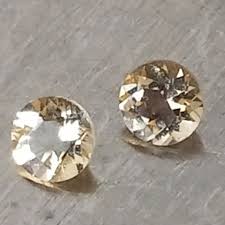 HELIODOR GEMSTONE PARCEL .50 CTW ROUND PARCEL OF 2