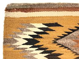 Lot - VINTAGE NAVAJO HAND WOVEN WOOL RUG