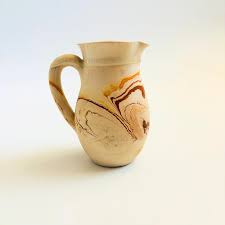 Nemadji Pottery Pitcher - Orange Swirls | Kashew