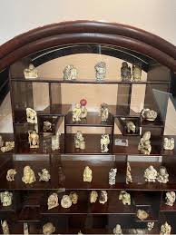 A Hardwood Moon Shape Display Cabinet, 20th century at 1stDibs