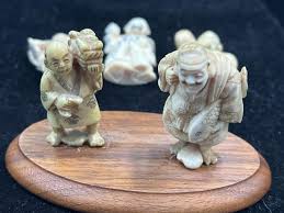Sold at Auction: Carved Ivory Nesukes