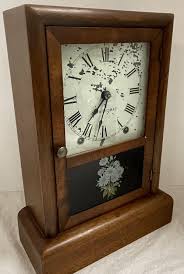 Sold at Auction: Seth Thomas Cottage Clock W/ Key and Pendulum