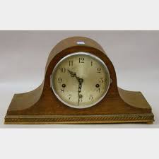 Sold at auction Enfield Clock Co. Oak Veneer Tambour Chiming Mantel Clock. Auction Number 2303 Lot Number 517B | Skinner Auctioneers
