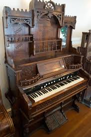 Lot - VICTORIAN WALNUT PARLOR PUMP ORGAN