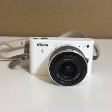 Nikon 1 J1 10.1MP Mirrorless Digital Camera Body only! Read ...