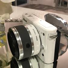 The Nikon 1 J1 with the versatile multi-purpose... | Depop