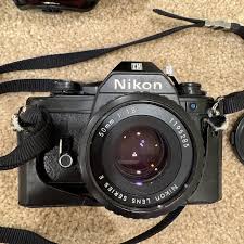 Nikon | Cameras, Photo & Video | Nikon Black Professional Film Camera With Prime Lens | Poshmark