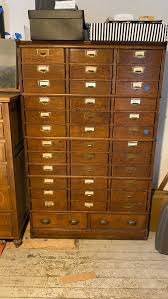 Sold at Auction: ANTIQUE OAK BARRISTER FILE CABINET
