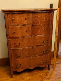 Beautiful Serpentine Oak Bonnet Chest | EstateSales.org