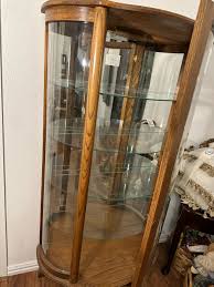 Wooden Oval Glass Curio Cabinet - Sandmann Auction Group
