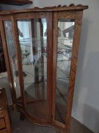 Corner showcase cabinet - Lil Dusty Online Auctions - All Estate Services, LLC