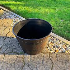 Reviews for Southern Patio 22.5 in. Dia x 15 in. H 70 qt. Dark Brown High-Density Resin Whiskey Barrel Outdoor Planter with Wheels | Pg 1 - The Home Depot