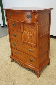 Sold at Auction: OAK LEXINGTON BONNET HIGH CHEST