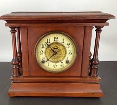 Lot - Mantle clock E. Ingraham Company. Measure 12” x 11”.