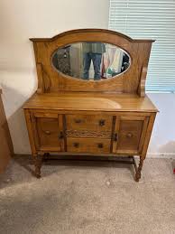 ANTIQUE ENGLISH OAK MIRRORED SIDEBOARD | EstateSales.org