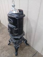 Sold at Auction: Ideal Oak Pot Belly Parlor Stove