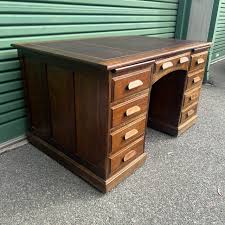 A 1920's desk with a tooled leather top - South Perth Antiques & Collectables
