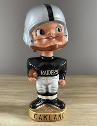 OAKLAND RAIDERS 1960's Football Earpad Player GEM MINT ...