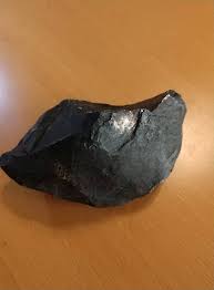 What is this mineral-like object with silver and gold colors?