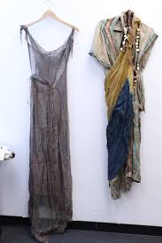 Sold at Auction: 2 genuine Spartacus screen worn dress w/ certificate