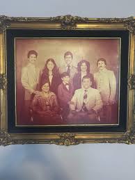 My dad's only childhood family photo got damaged because of ...