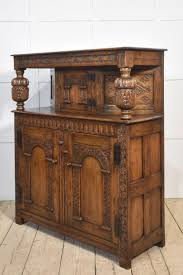 Carved oak court cupboard For Sale at 1stDibs