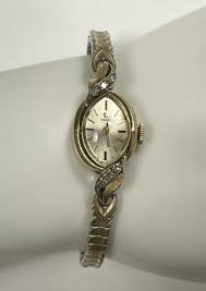 Sold at Auction: Ladies 14K Omega Dress Watch w/ Diamond Accents