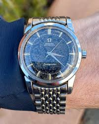 Love the patina on this original black gilt dial Omega Seamaster from the late 1950s π #omegaseamaster #vintageomegaseamaster #seamaster #vintageomega #omega #omegavintage #omegawatches #omegawatch #vintageomegawatch #vintageomegawatches #vintagewatch ...