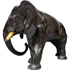 Vintage metal elephant statue. For Sale at Ruby Lane