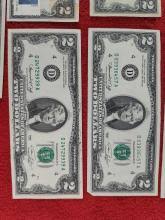 Sold at Auction: 9 2 dollar bills