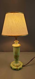 Sold at Auction: Houzex swirled slag glass lamp