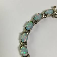 Sold at Auction: Sterling Silver Opal Bracelet