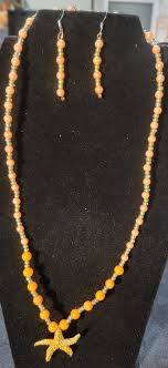 Faux gold starfish with peach and gold necklace | MakerPlace by Michaels