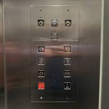 An old single speed elevator with Dewhurst buttons in the ...