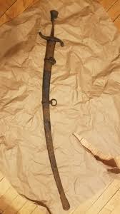 Help me identify this sword I got for Christmas. : r/SWORDS