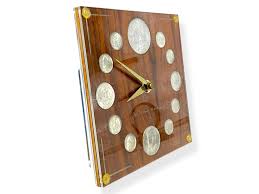 Sold at Auction: U.S. "Silver Heritage" Wall Clock with Coin ...