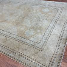 HERAT ORIENTAL Handmade Khotan Wool Rug - 6'9" x 9'7" - On ...