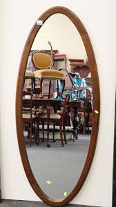 Sold at Auction: SURFBOARD SHAPED LARGE MIRROR WITH WOODEN FRAME