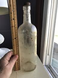 antique clear glass bottle with peacock bird on front, gibson ...