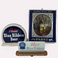 Sold at Auction: Group of Three Pabst Beer Advertising Signs, Nice collection of three vintage circa 1960s Pabst Beer advertising signs. Comprising two electrically illuminated plastic signs: one styled as a wall