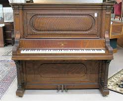 Lot - AN AMERICAN OAK UPRIGHT GRAND PIANO, Ludwig & Co., New ...