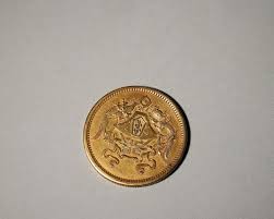 Sold at Auction: A dragon and phoenix patterned gold coin,Qing Dynasty,China,Qing Dynasty,China