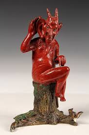 Lot - DEVIL TABLE LIGHTER - Late 19th Painted Spelter Table Lighter in the form of the Devil listening in with lizard & squirrel on the tree