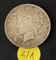 Sold at Auction: 1922 Toned US Silver Peace Dollar Coin