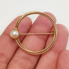 Sold at Auction: Vintage gold tone faux pearl Circle brooch