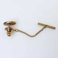 Sold at Auction: Gold tone satin finish Letters Initials G M oval shape tie pin