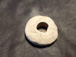 Roman lead spindle whorl found at Aberford Yorkshire. See ...